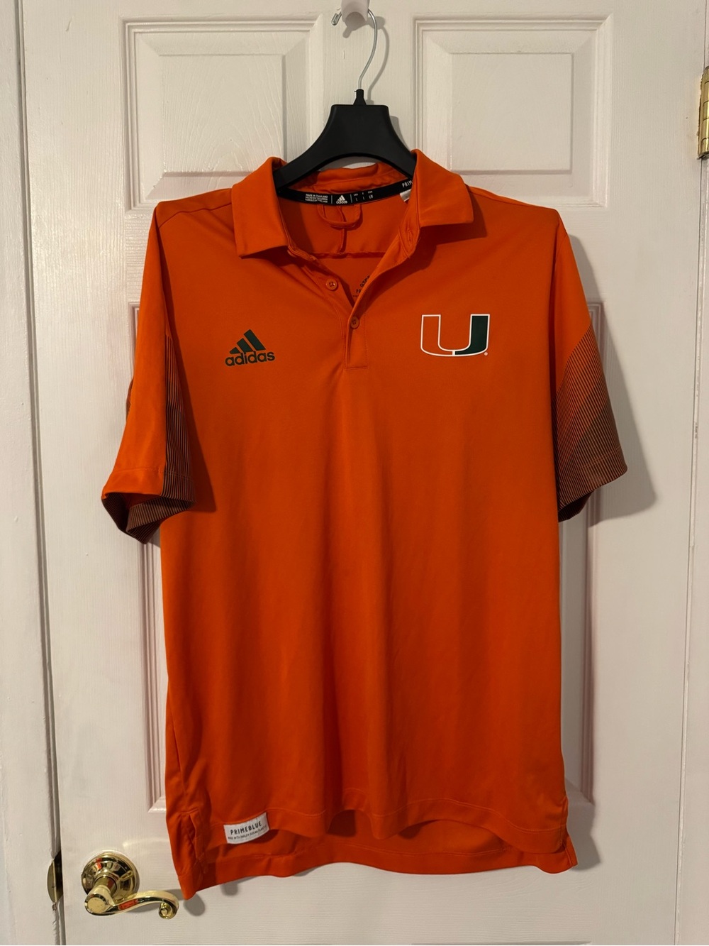 adidas Men’s Orange university of Miami Hurricanes Polo with Green Logo